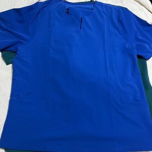 Mandala scrub set 2x top and 2x petite bottoms. untreated spots on shirt.